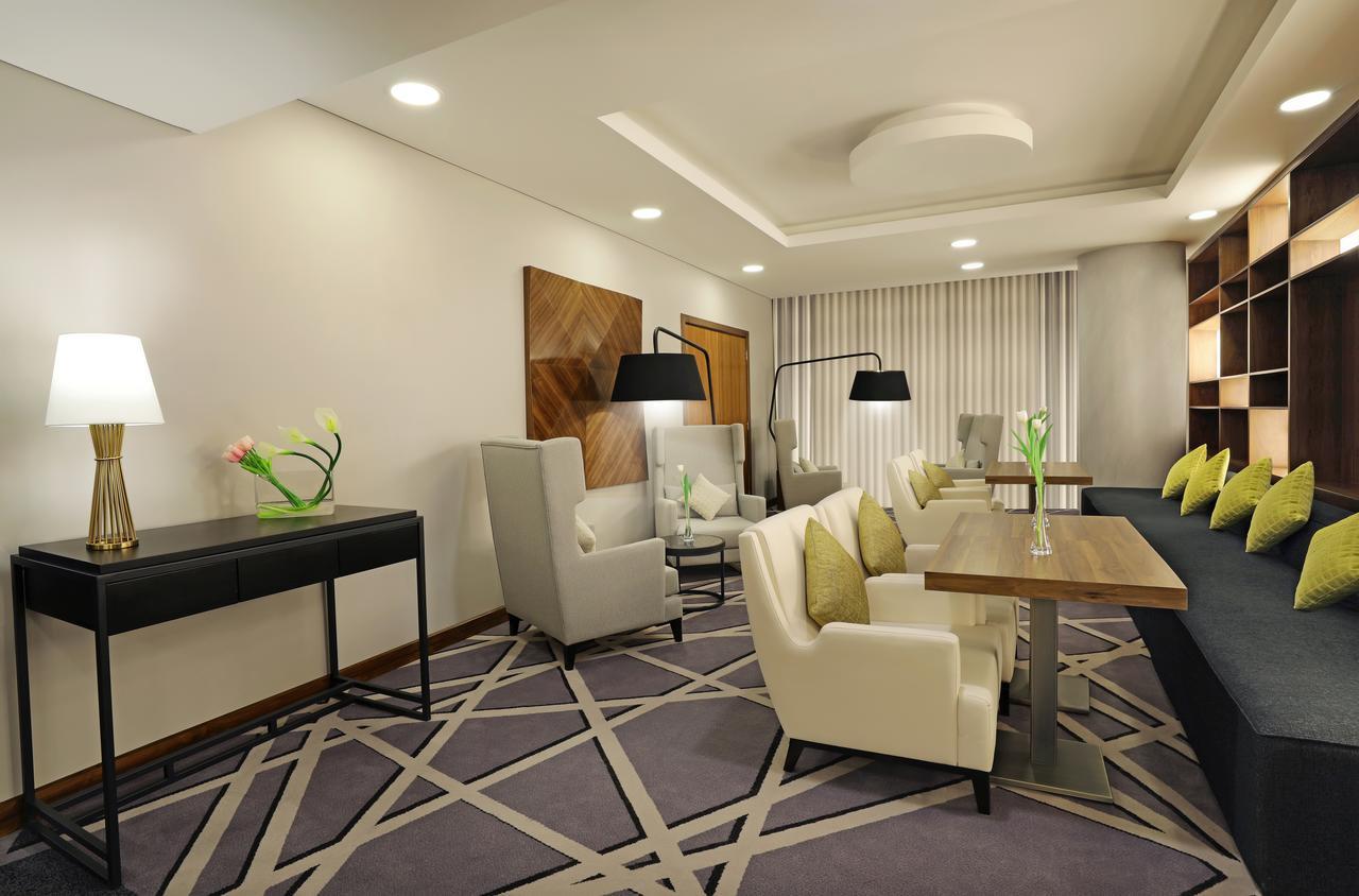 ミレニアム マディーナ エアポート ホテル エクステリア 写真 A 3D rendering of a living room